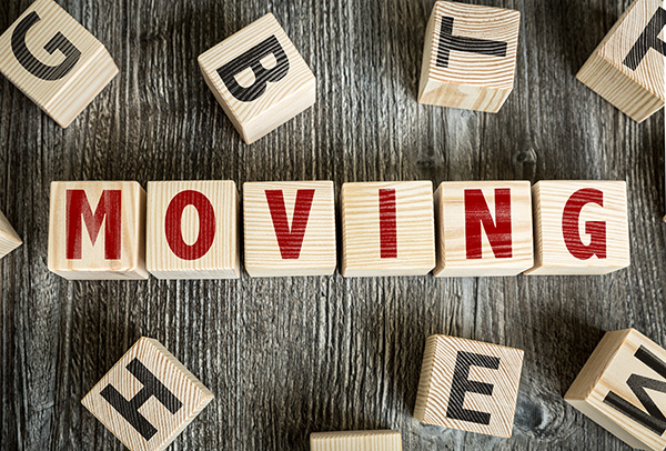 Wooden Blocks with the text: Moving