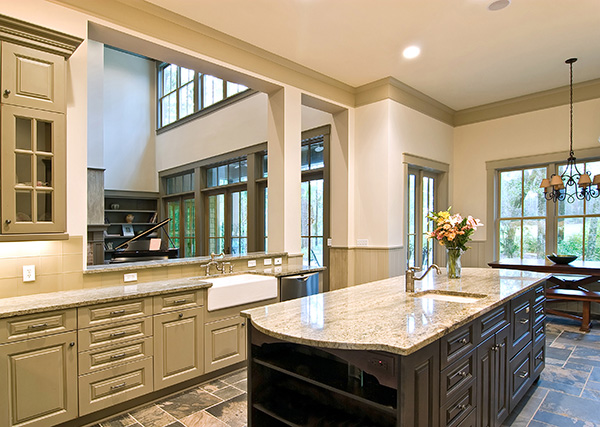 Beautiful open plan kitchen island with granite countertops